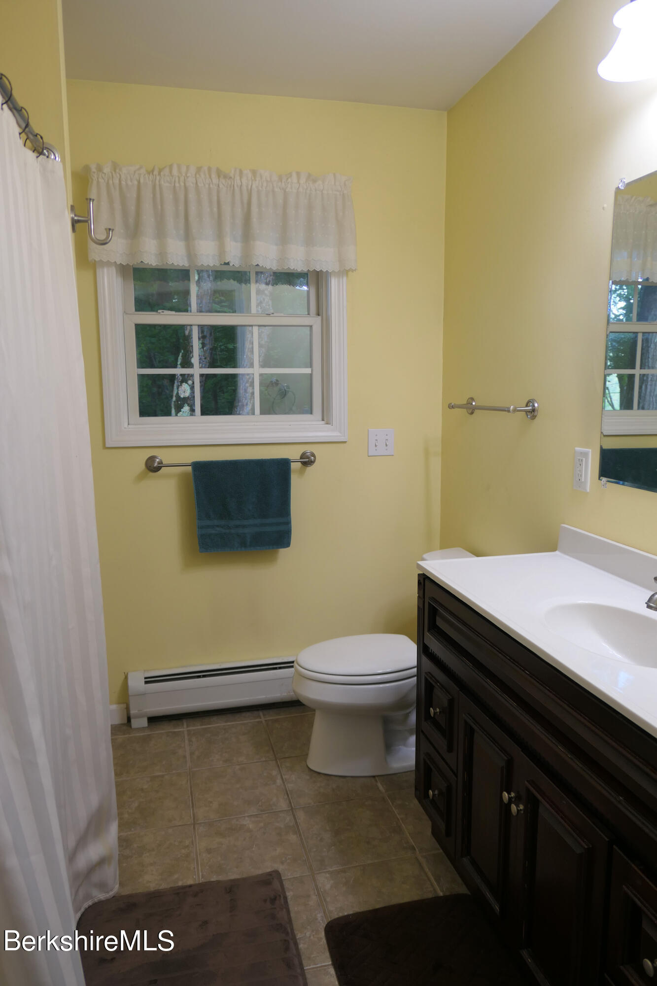 3512 Jacobs Ladder Road Becket, MA 01223 - Photo 28 of 42 a bathroom with a sink and a toilet