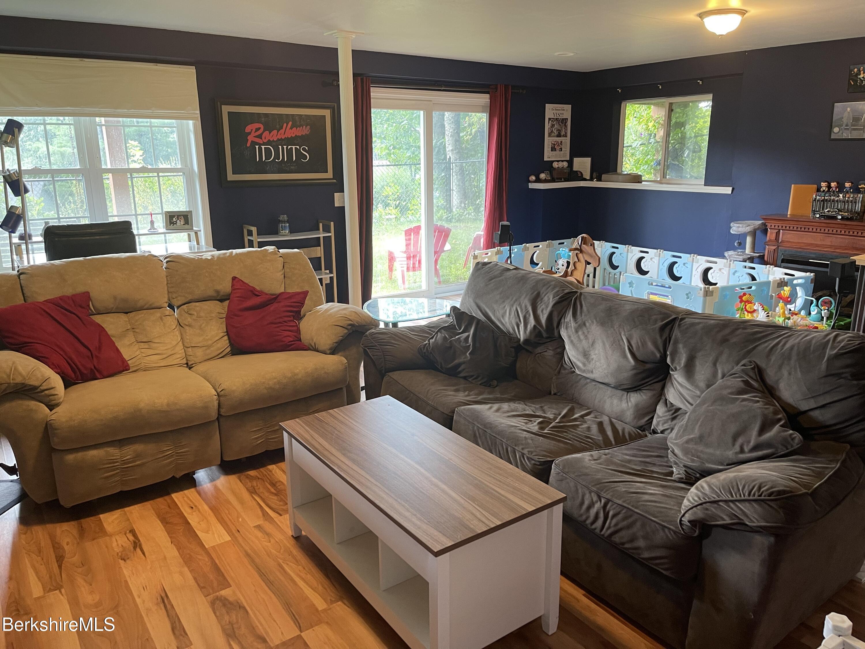 3512 Jacobs Ladder Road Becket, MA 01223 - Photo 29 of 42 a living room with furniture and a flat screen tv
