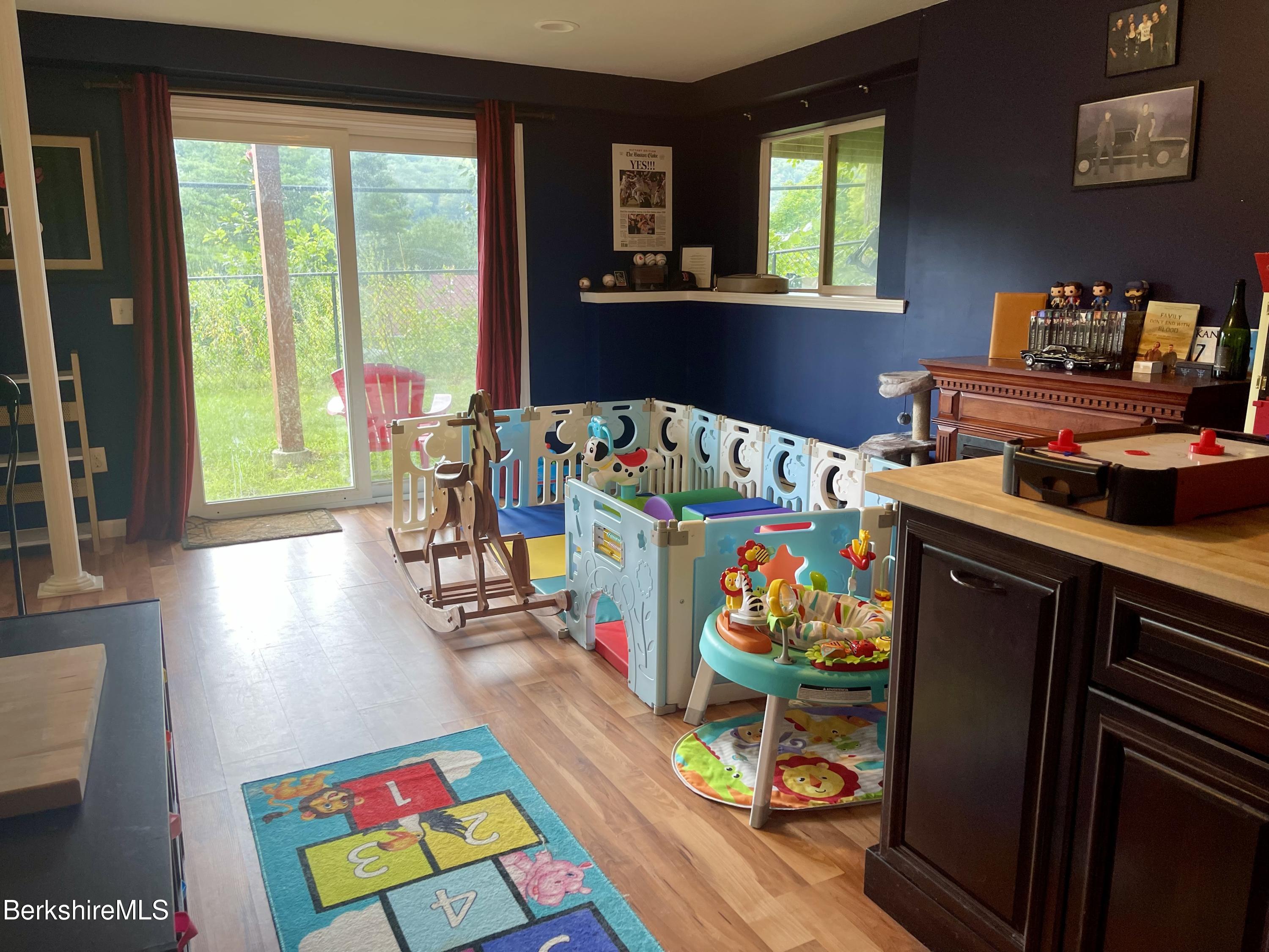 3512 Jacobs Ladder Road Becket, MA 01223 - Photo 30 of 42 a room with furniture and a window