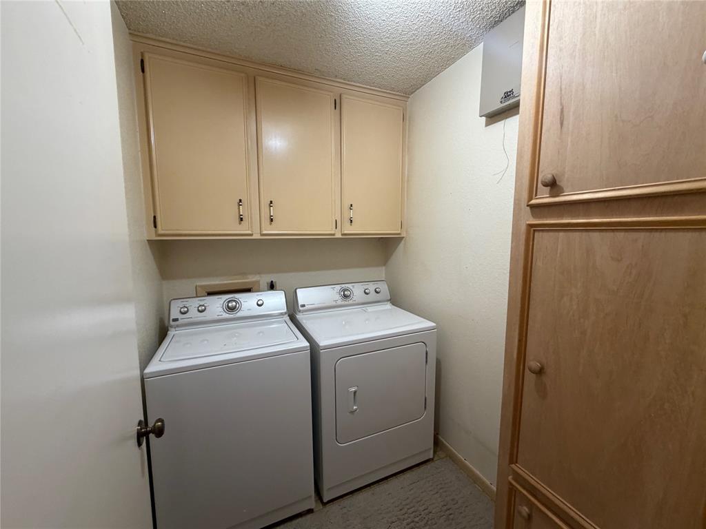 1218 Nottingham Road Abilene, TX 79602 - Photo 7 of 22 a utility room with dryer and washer