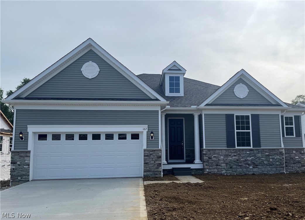 162 Seamore Road Aurora, OH 44202 - Photo 1 of 14 View of front of house featuring a garage