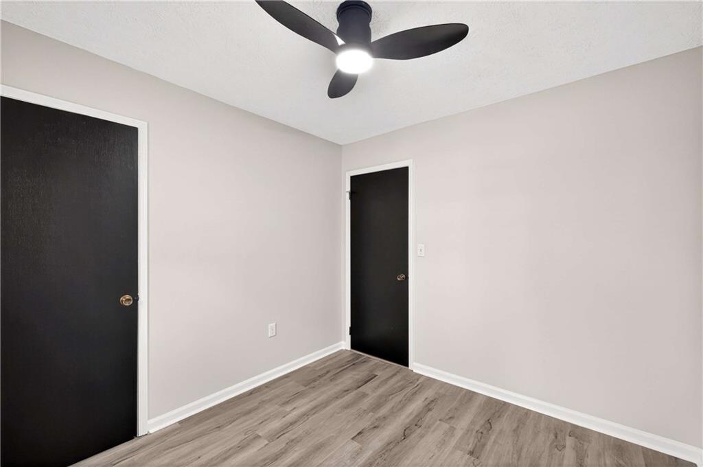 752 Maple Drive Riverdale, GA 30274 - Photo 17 of 35 wooden floor in an empty room