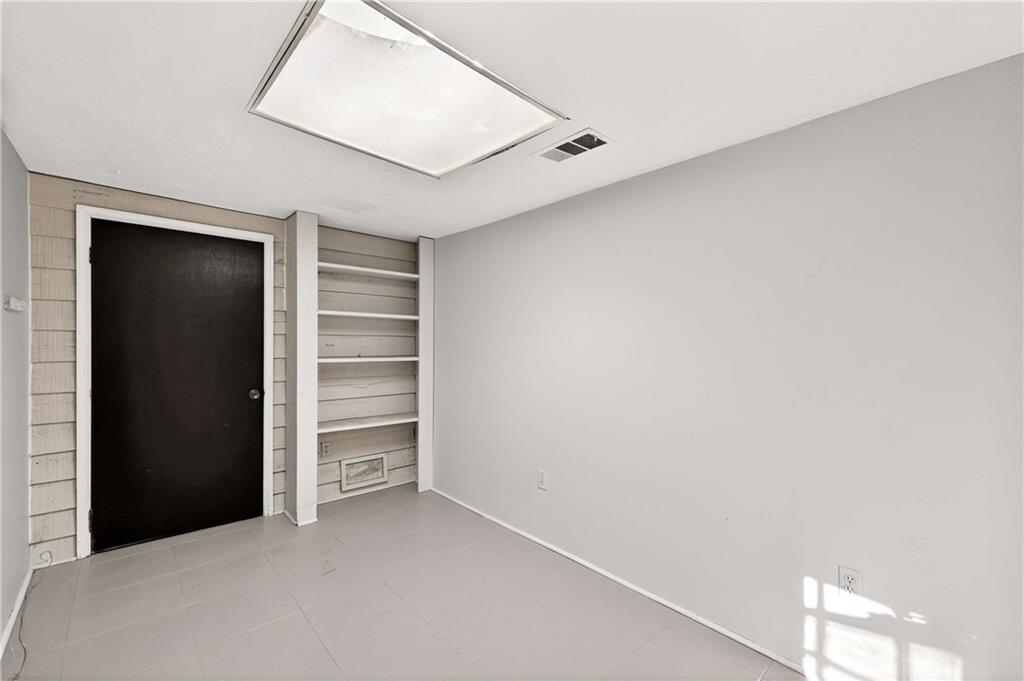 752 Maple Drive Riverdale, GA 30274 - Photo 27 of 35 a view of an empty room with a closet