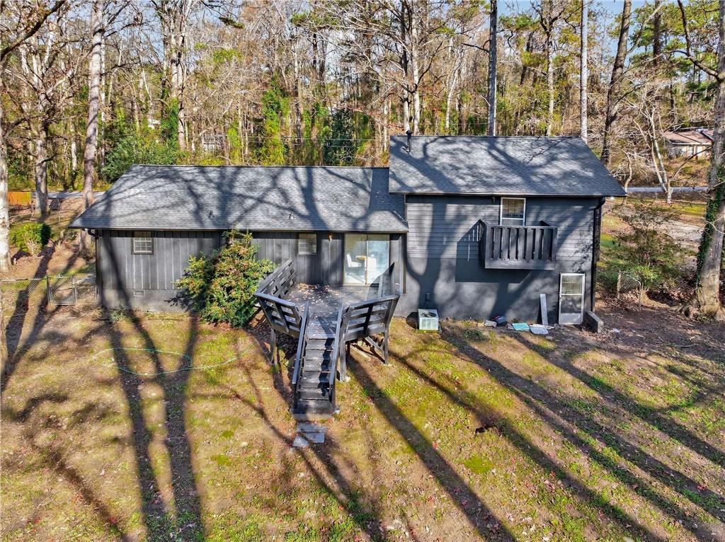 752 Maple Drive Riverdale, GA 30274 - Photo 33 of 35 a view of a chairs and table on the patio