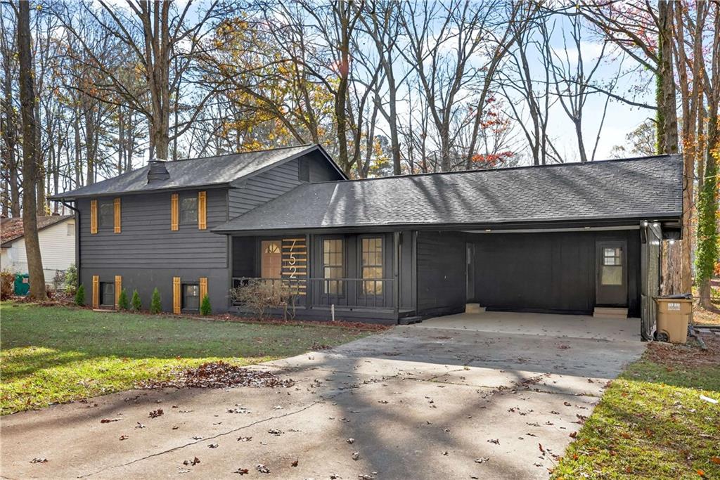 752 Maple Drive Riverdale, GA 30274 - Photo 4 of 35 a front view of a house with a yard