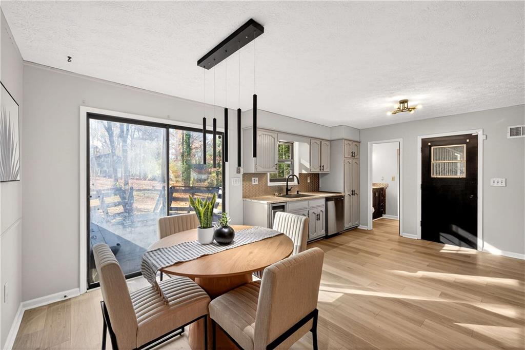 752 Maple Drive Riverdale, GA 30274 - Photo 7 of 35 a dining room with furniture and window