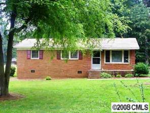 2187 Airdale Road Lancaster, SC 29720 - Photo 2 of 8 a front view of a house with a garden