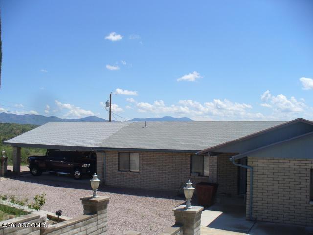 a front view of a house with patio