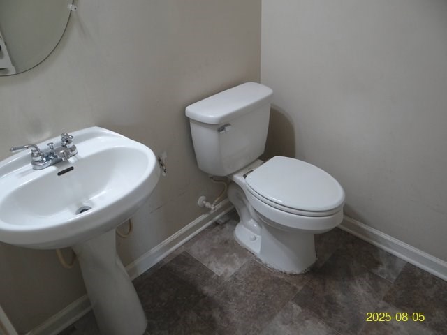 2 Sugar Maple Drive Fort Mitchell, AL 36856 - Photo 13 of 21 a white toilet sitting next to a bathroom sink