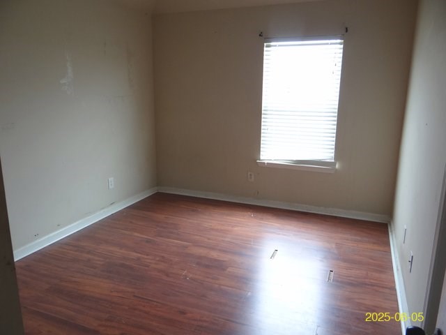 2 Sugar Maple Drive Fort Mitchell, AL 36856 - Photo 14 of 21 an empty room with wooden floor and windows