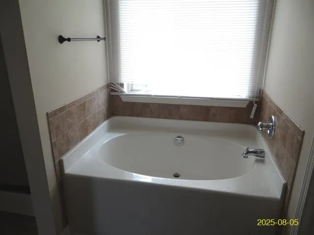 a bathroom with a bathtub