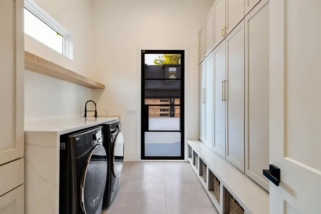a view of a hallway with storage and utility