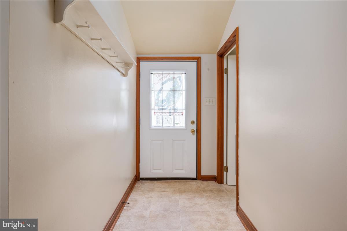 752 Valentine Road Crownsville, MD 21032 - Photo 20 of 47 Entry way from deck.Laundry room on the left.