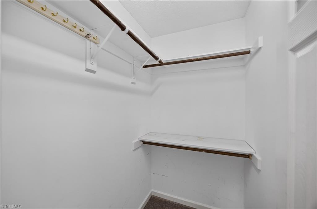 8116 Thorndike Road Greensboro, NC 27409 - Photo 15 of 22 Primary Bedroom Closet