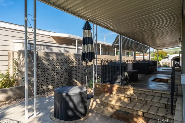a view of a porch with furniture
