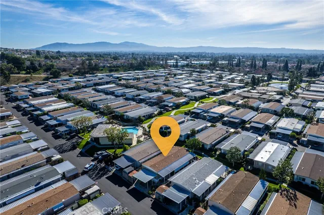 an aerial view of a swimming pool with outdoor space