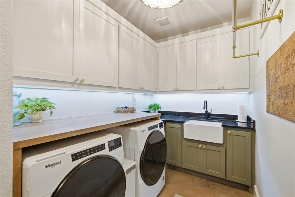 200 Greene Road Wilmer, TX 75172 - Photo 32 of 40 a utility room with sink dryer and washer