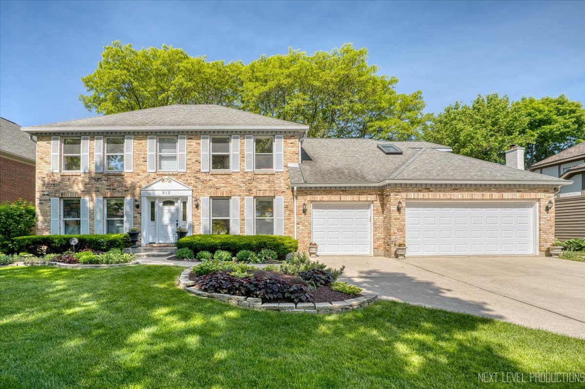 912 Turnbridge Circle Naperville, IL 60540 - Photo 1 of 34 front view of a house with a yard