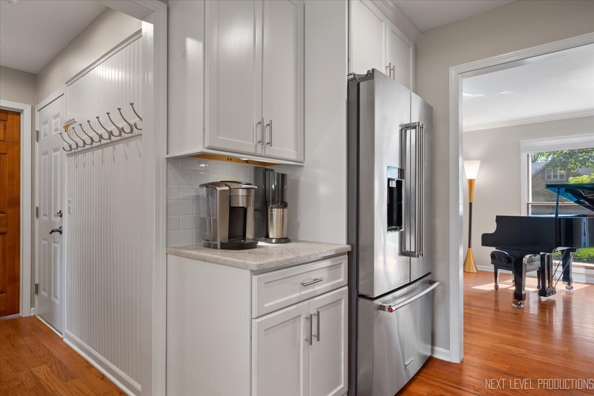 912 Turnbridge Circle Naperville, IL 60540 - Photo 14 of 34 a kitchen with stainless steel appliances granite countertop a refrigerator and a stove top oven