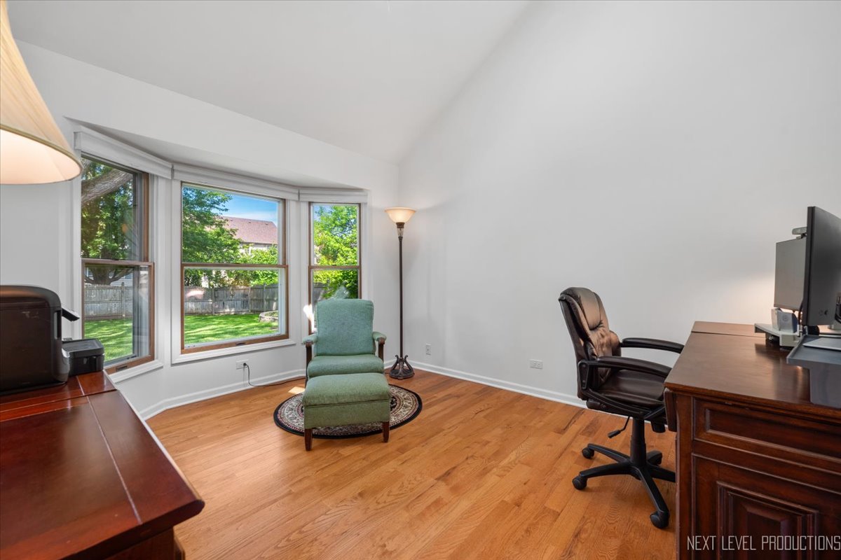 912 Turnbridge Circle Naperville, IL 60540 - Photo 20 of 34 a view of a workspace with furniture and a window