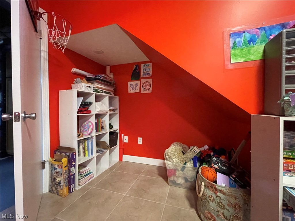 9104 Cherry Road Vermilion, OH 44089 - Photo 19 of 27 Lower level family room.