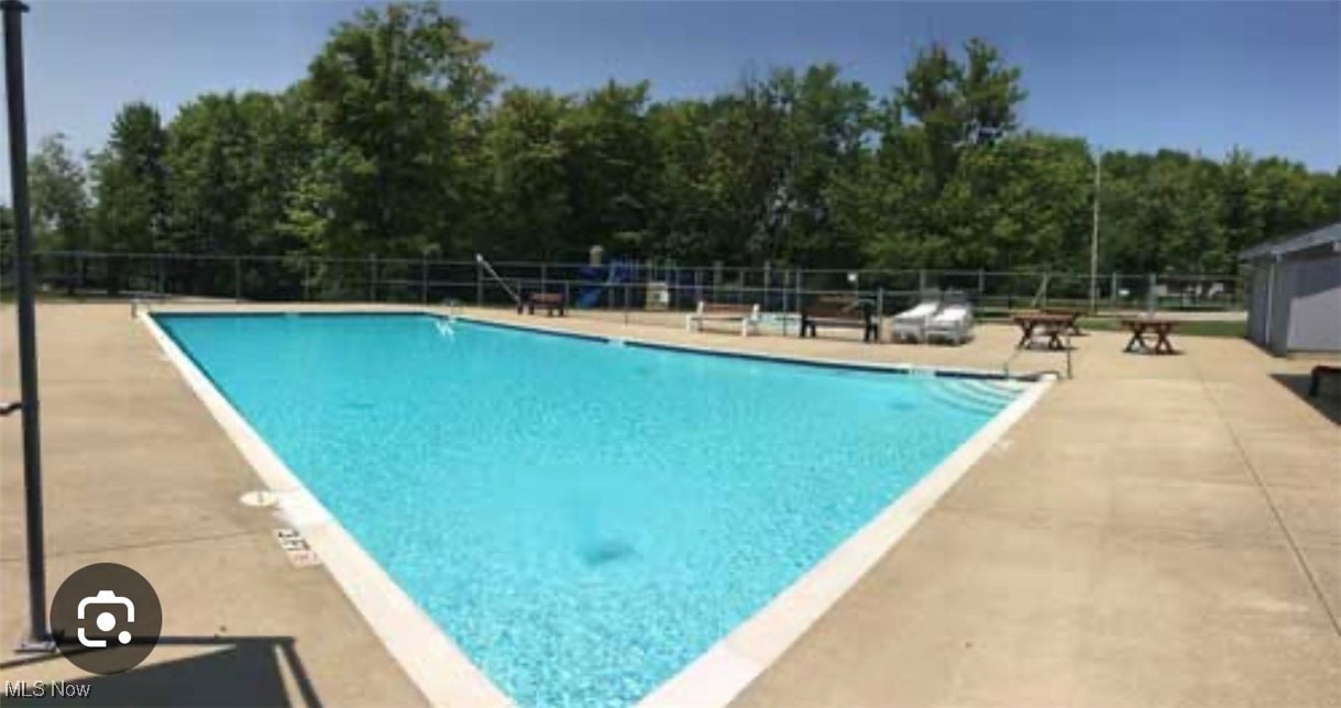 Callender Road Rock Creek, OH 44084 - Photo 14 of 14 Community pool with a patio and fence