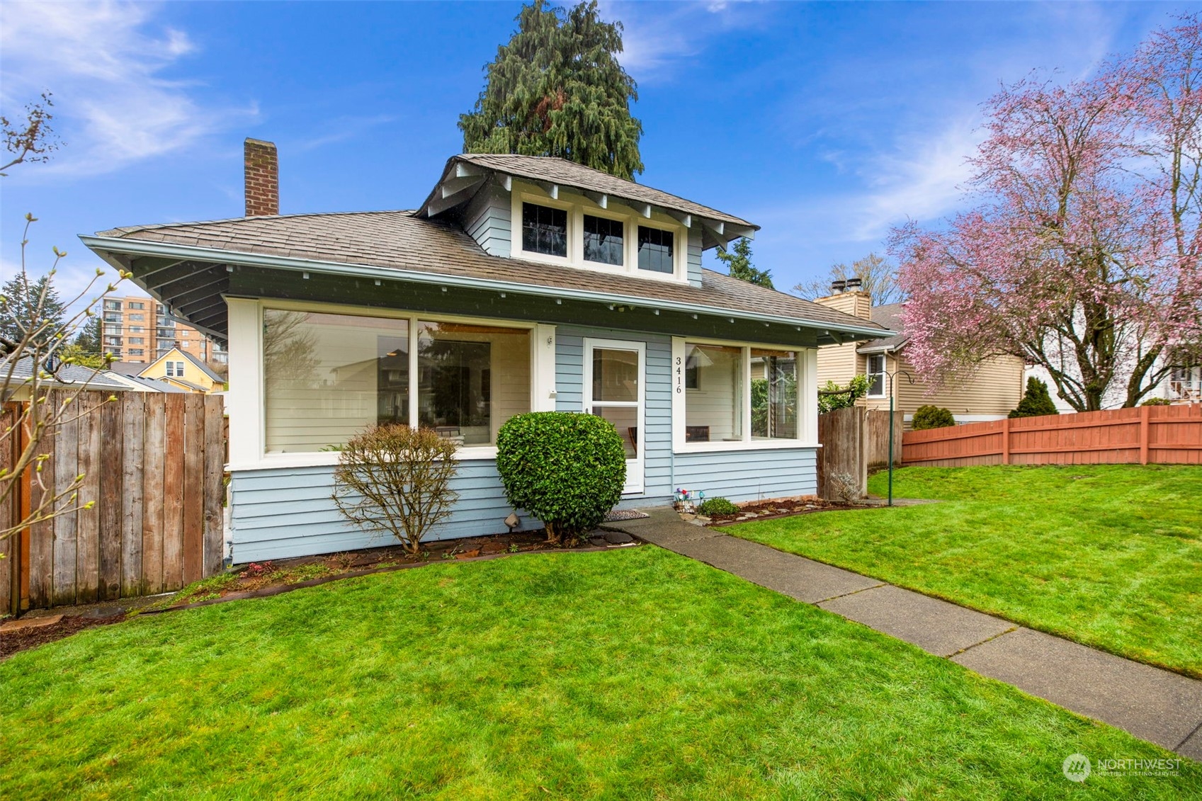 3416 Rockefeller Avenue Everett, WA 98201 - Photo 1 of 40 a front view of a house with garden