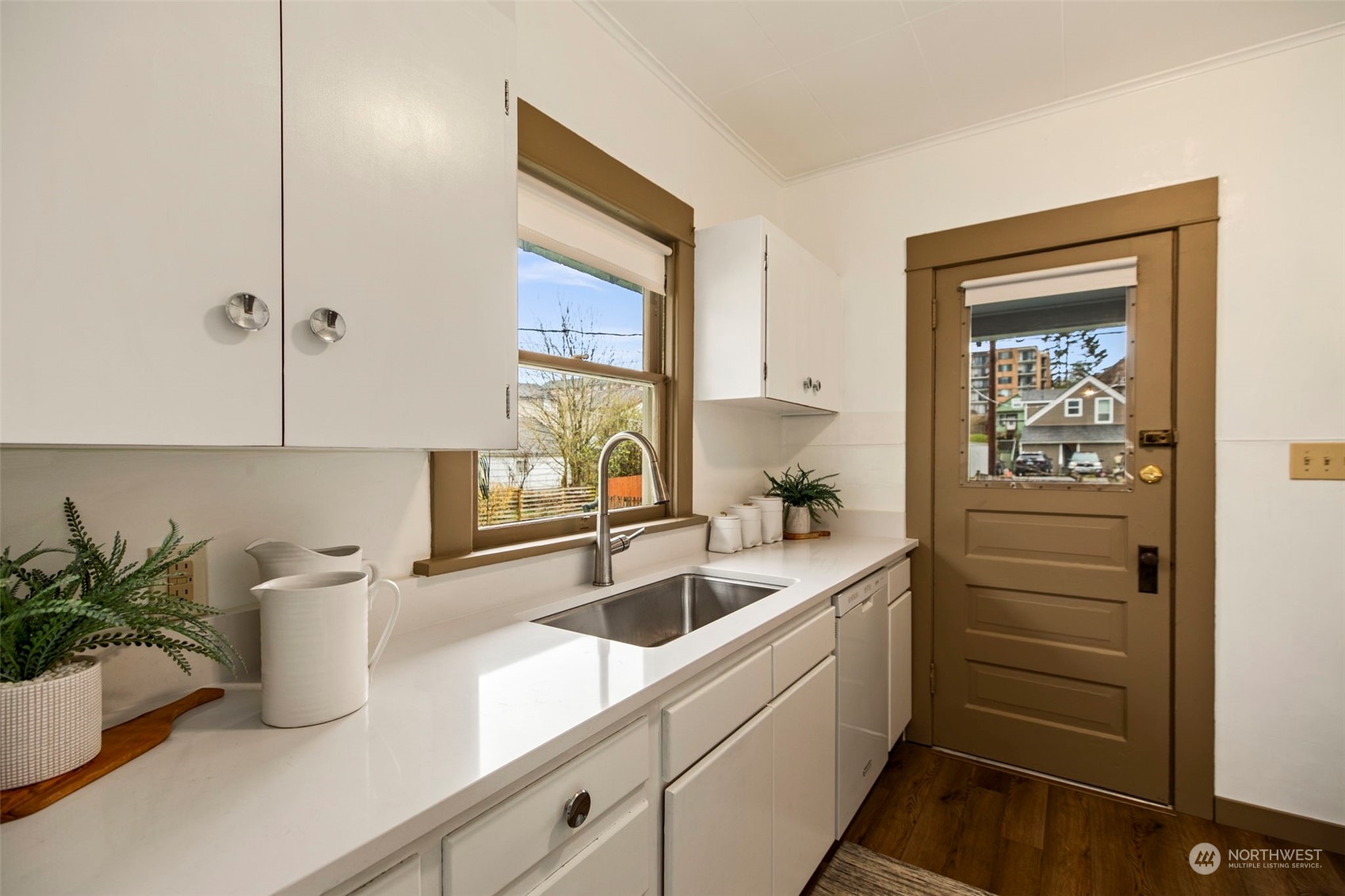3416 Rockefeller Avenue Everett, WA 98201 - Photo 16 of 40 a kitchen with a sink and cabinets