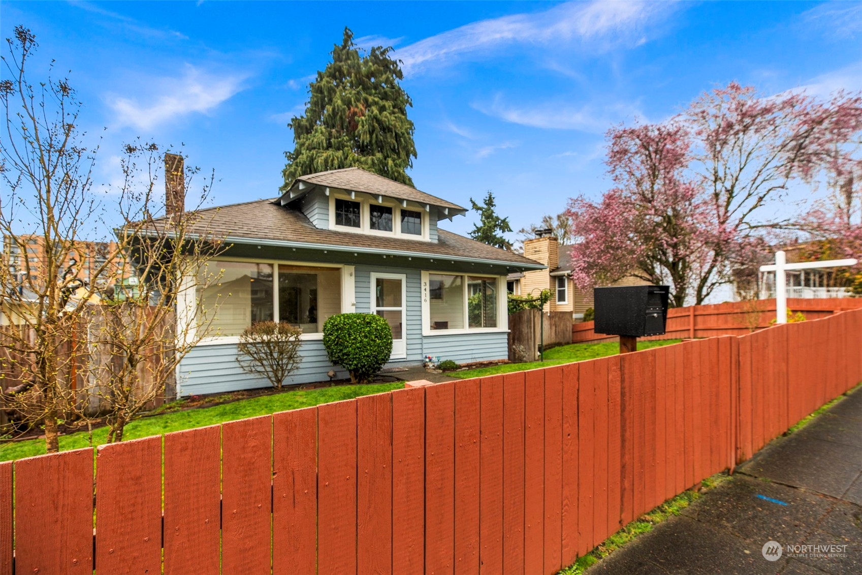 3416 Rockefeller Avenue Everett, WA 98201 - Photo 2 of 40 a front view of a house with a yard