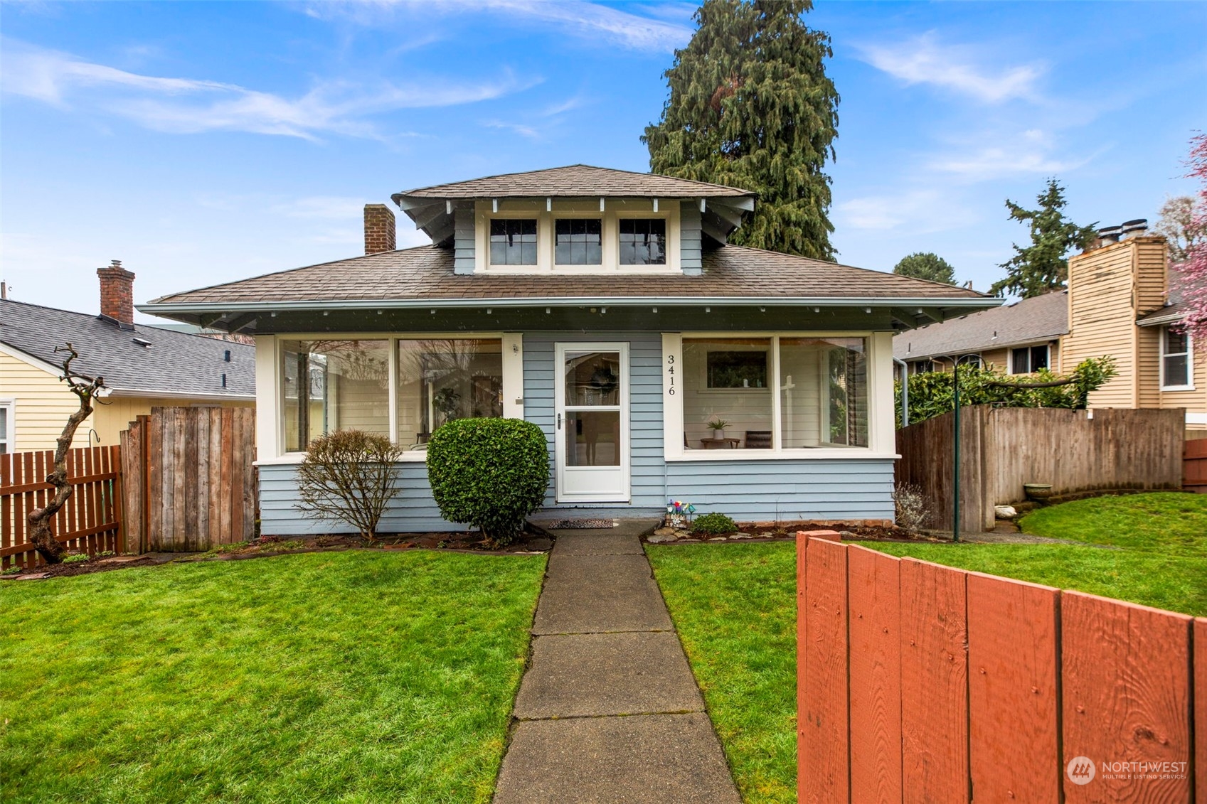 3416 Rockefeller Avenue Everett, WA 98201 - Photo 3 of 40 a front view of a house with garden