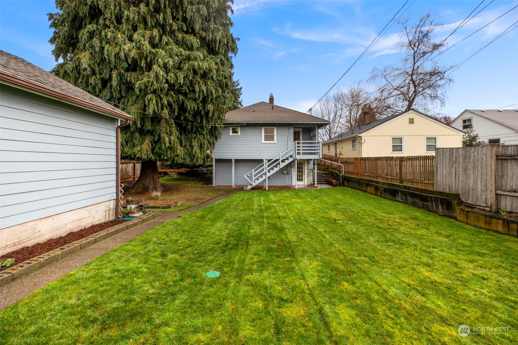3416 Rockefeller Avenue Everett, WA 98201 - Photo 32 of 40 a view of a house with a yard and sitting area