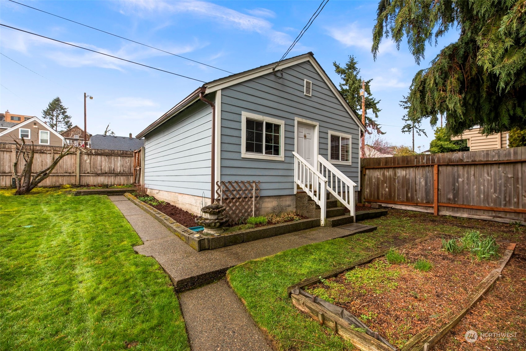 3416 Rockefeller Avenue Everett, WA 98201 - Photo 33 of 40 a view of a house with a yard