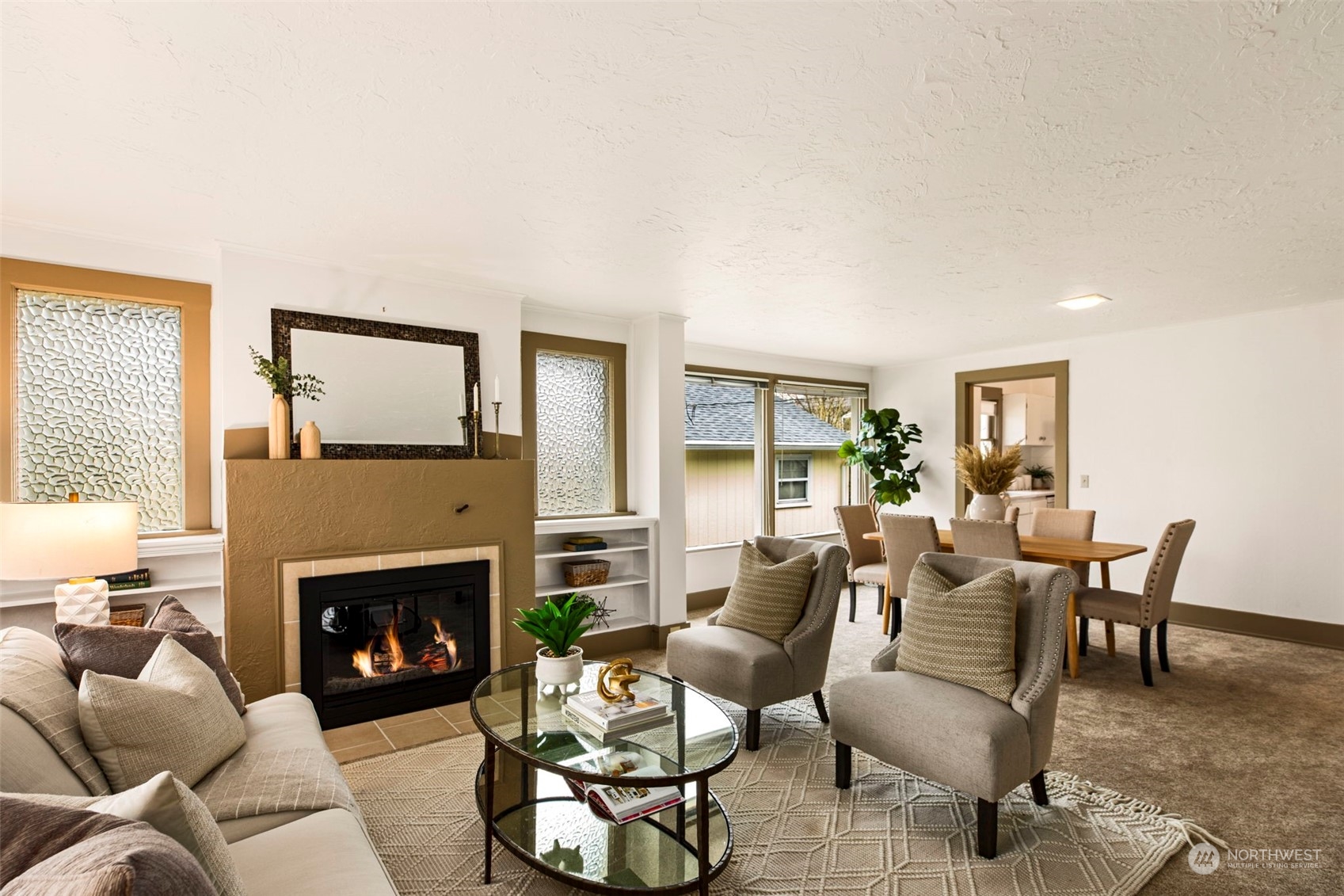 3416 Rockefeller Avenue Everett, WA 98201 - Photo 6 of 40 a living room with furniture a fireplace and a large window