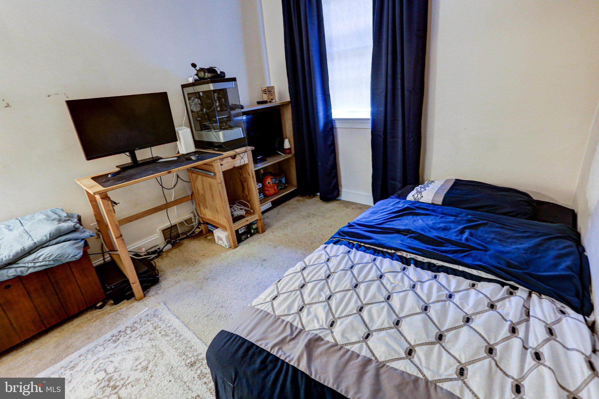125 West Thomson Avenue Springfield, PA 19064 - Photo 34 of 41 Cozy bedroom with modern touches.