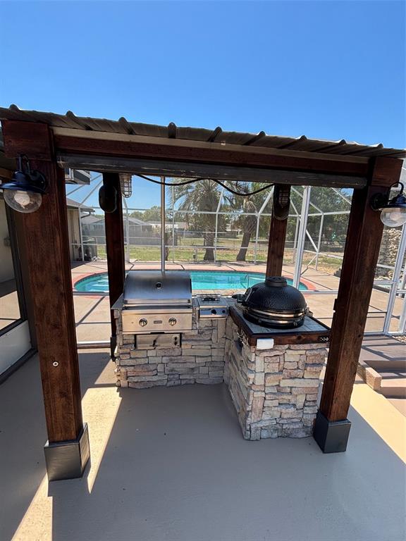 9801 Southeast Sunset Harbor Road Summerfield, FL 34491 - Photo 24 of 37 a backyard of a house with outdoor seating