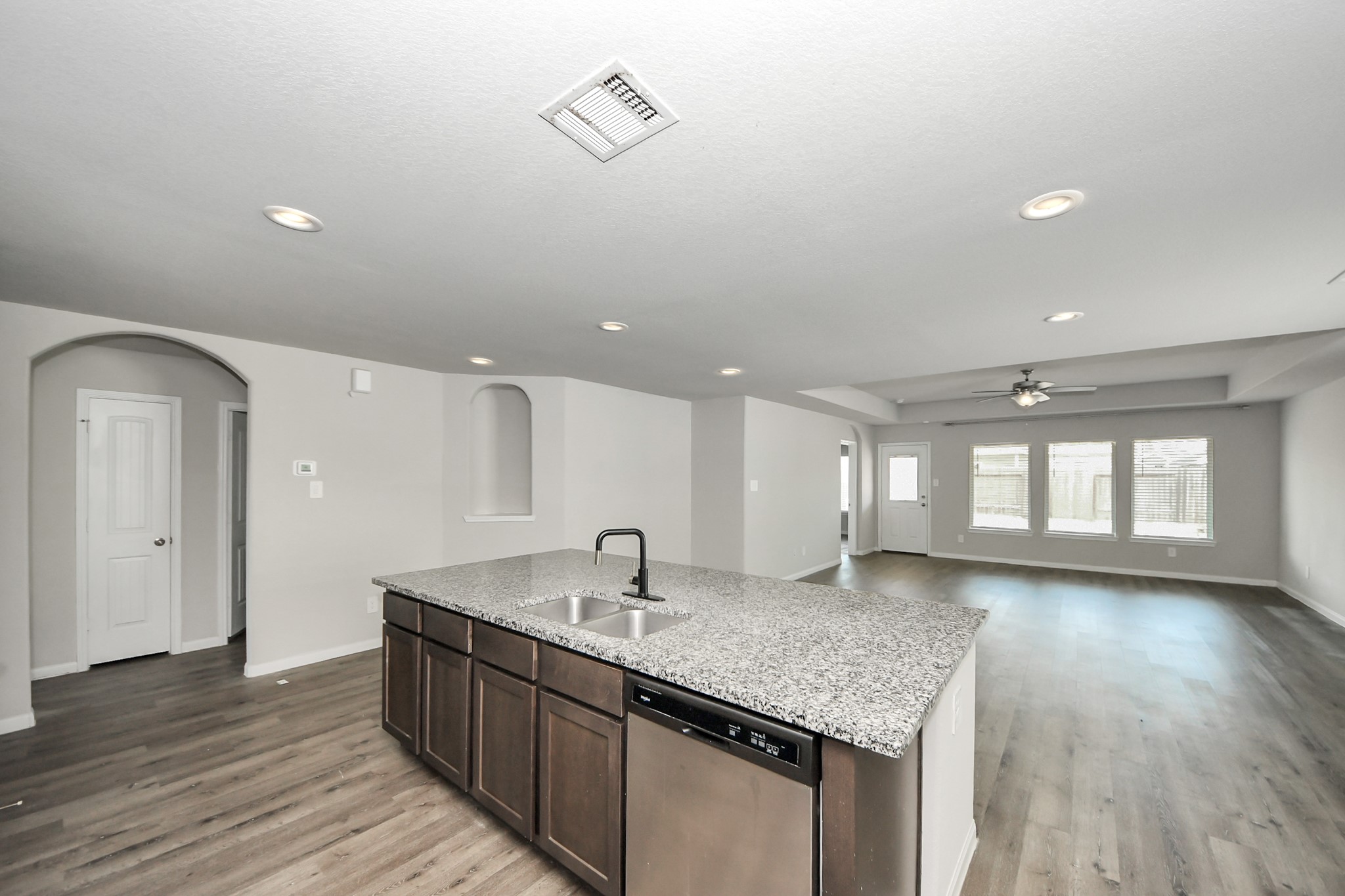5626 Brooklyn Rose Drive Rosharon, TX 77583 - Photo 12 of 34 a bathroom with a granite countertop sink and a large mirror