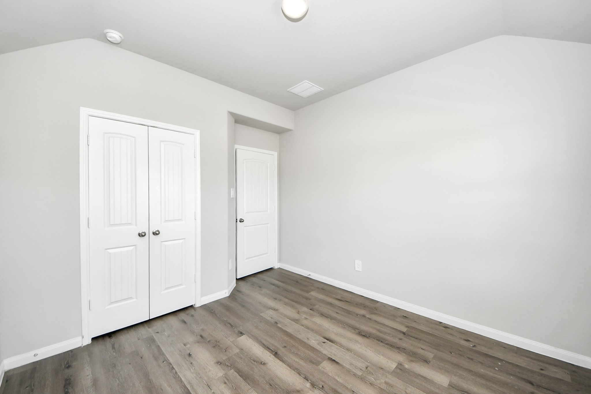 5626 Brooklyn Rose Drive Rosharon, TX 77583 - Photo 27 of 34 a view of an empty room with wooden floor