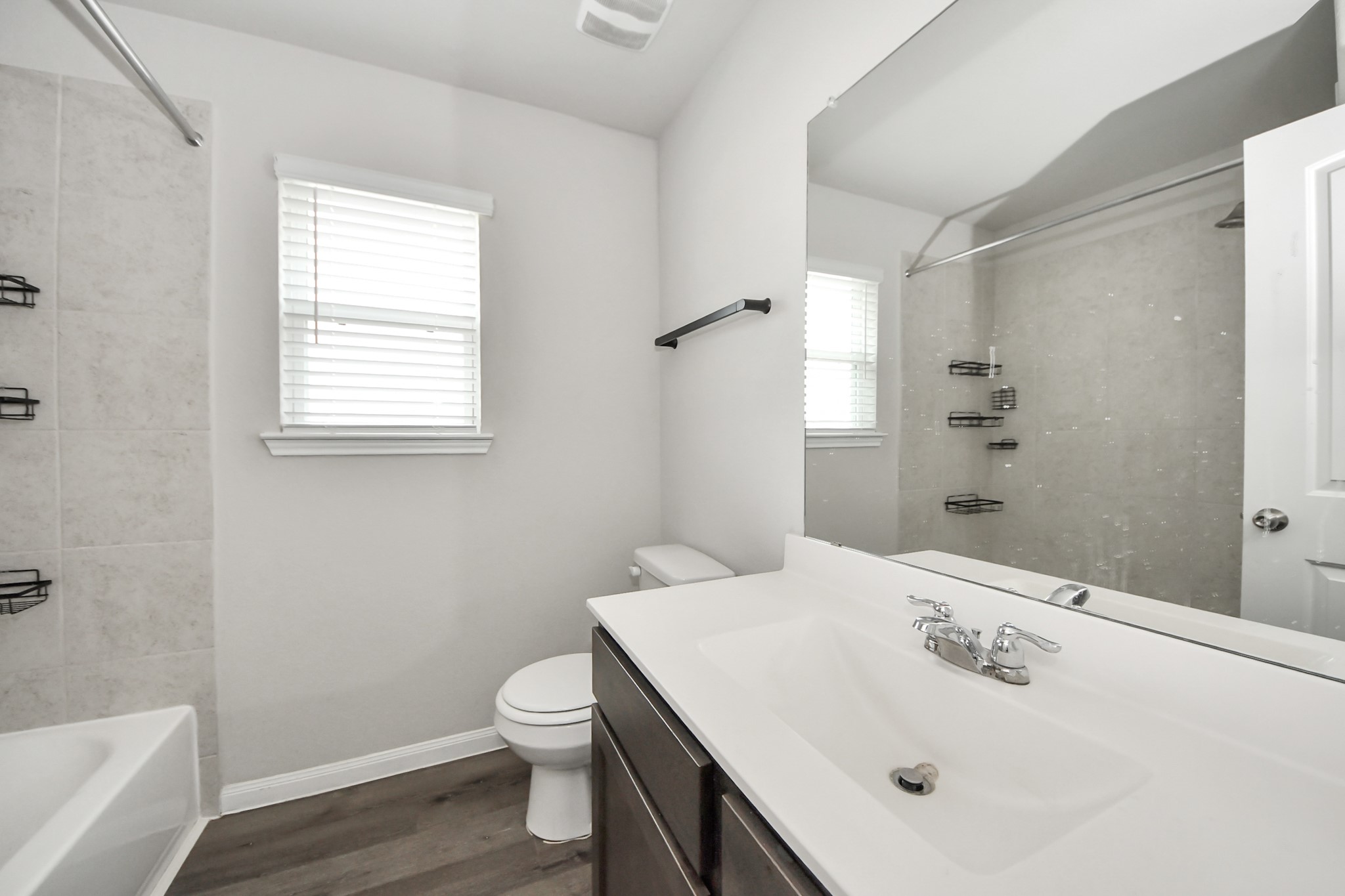 5626 Brooklyn Rose Drive Rosharon, TX 77583 - Photo 28 of 34 a bathroom with a sink toilet and vanity