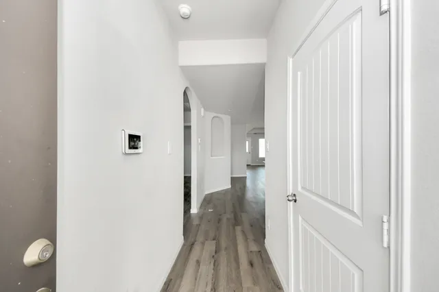 a view of a bathroom from the hallway