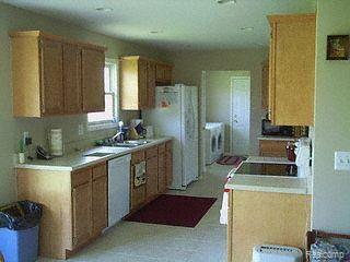 4612 Duce Road Avoca, MI 48006 - Photo 5 of 6 Oaks cabinets w/ ceramic floor