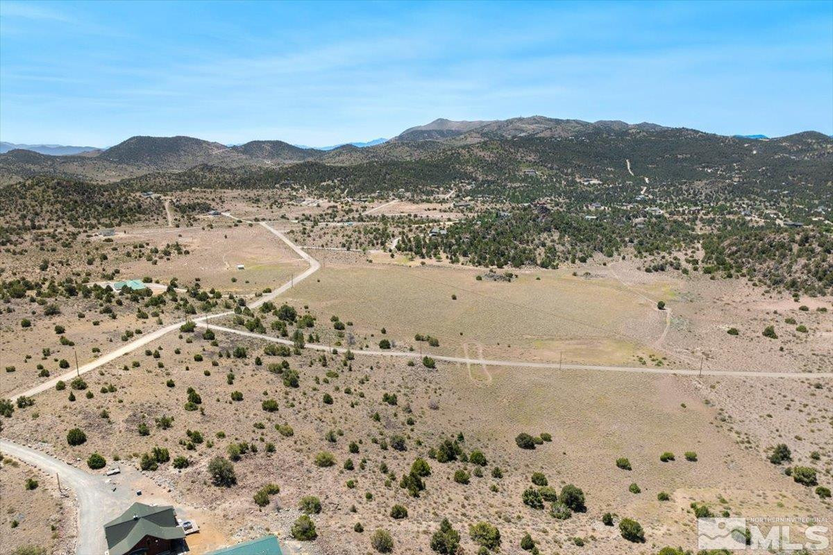 3610 Overland Road Reno, NV 89521 - Photo 11 of 18 a view of a mountain with a mountain in the background