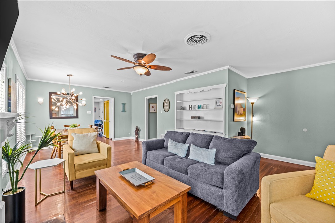 438 Indiana Avenue Corpus Christi, TX 78404 - Photo 2 of 8 a living room with furniture and wooden floor