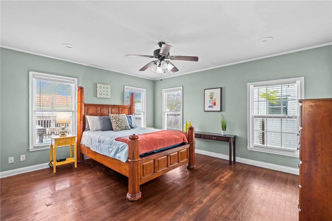 438 Indiana Avenue Corpus Christi, TX 78404 - Photo 4 of 8 a bedroom with a bed and a chair with the outer view