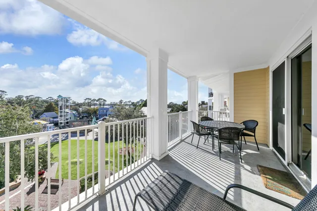 a view of balcony with furniture