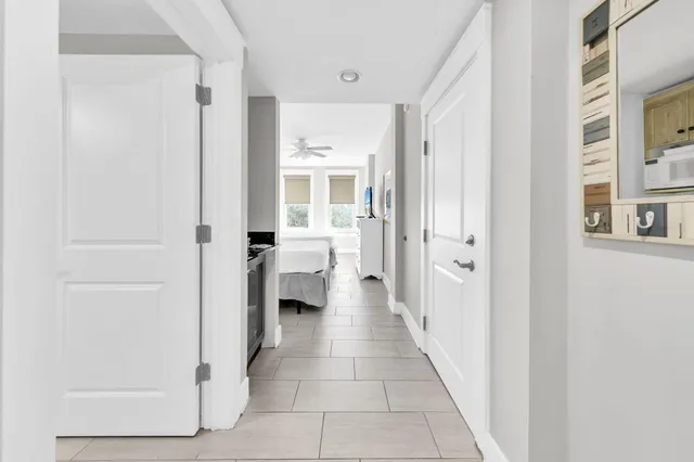 a view of a hallway with a white walls