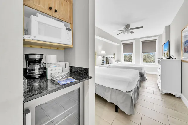 a living room with granite countertop furniture and a fireplace