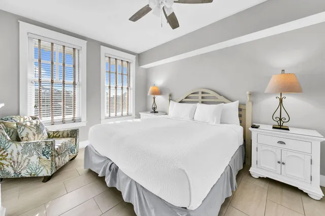 a bedroom with bed and window