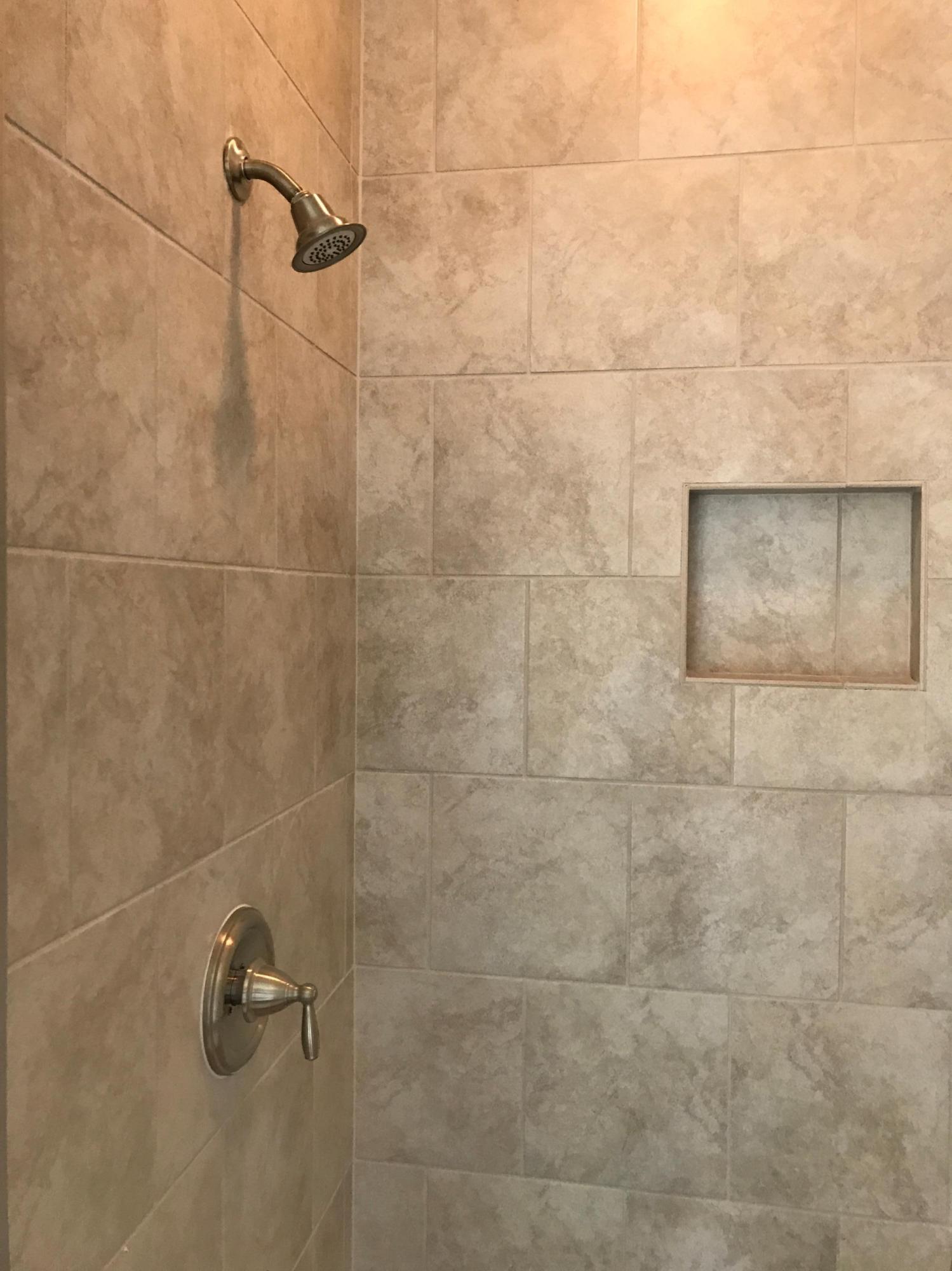 234 Pin Oak Loop Santa Rosa Beach, FL 32459 - Photo 16 of 22 a bathroom with a shower
