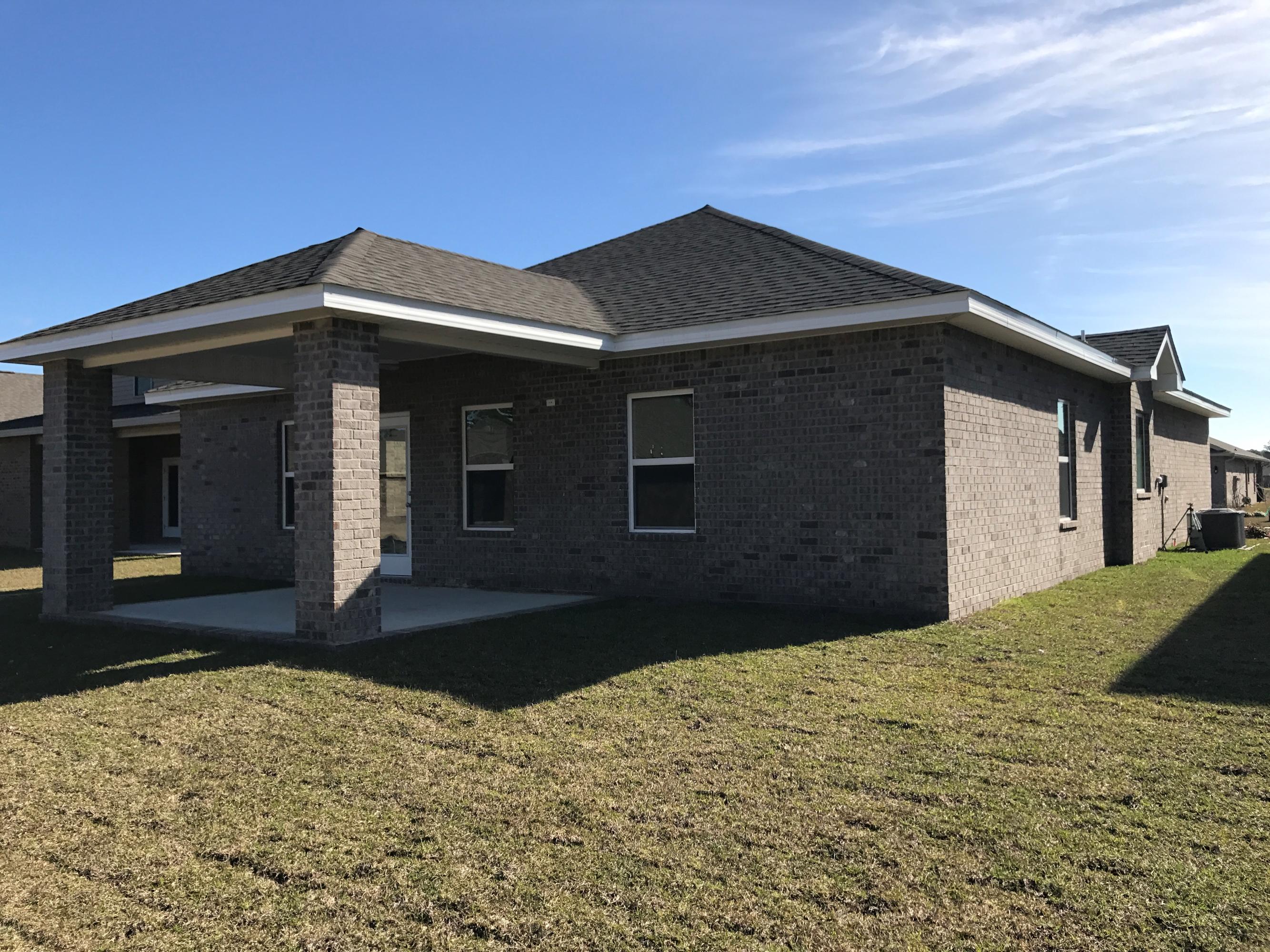 234 Pin Oak Loop Santa Rosa Beach, FL 32459 - Photo 19 of 22 a front view of a house