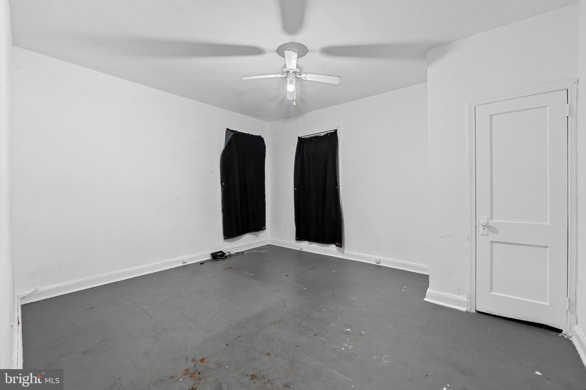 1701 6th Street Northwest Washington, DC 20001 - Photo 9 of 23 an empty room with chandelier fan